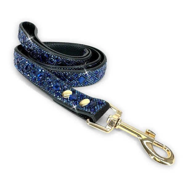 A faux leather pet leash with navy blue glass crystals and a gold swivel clasp